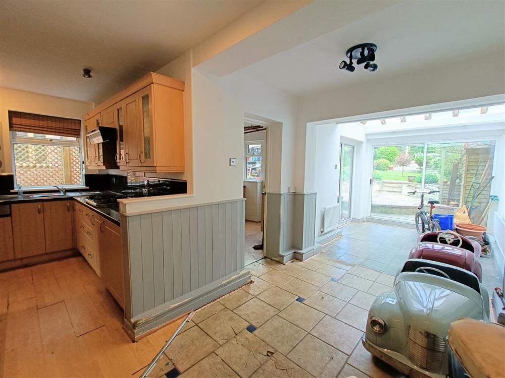 KITCHEN THROUGH DINING ROOM